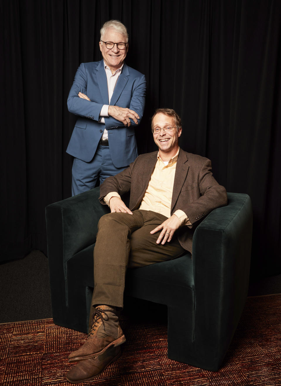 Harry Bliss, seated, and Steve Martin pose for a portrait to promote the book "Number One Is Walking: My Life in the Movies and Other Diversions" on Thursday, Nov. 3, 2022, in New York. (Photo by Matt Licari/Invision/AP)