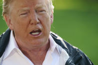 President Donald Trump talks to media before boarding Marine One on the South Lawn of the White House in Washington, Wednesday, Sept. 19, 2018, for the short trip to Andrews Air Force Base en route to Havelock, N.C. (AP Photo/Carolyn Kaster)