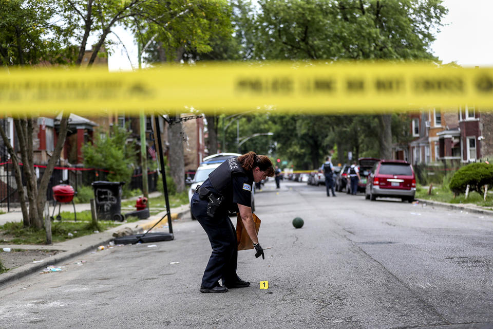 Judge: An officer collects evidence at the scene where an 8-year-old girl was shot on the 1000 block of North Monticello Avenue on Aug. 11, 2019 in Chicago. (Armando L. Sanchez/Chicago Tribune / TNS via Getty Images file)