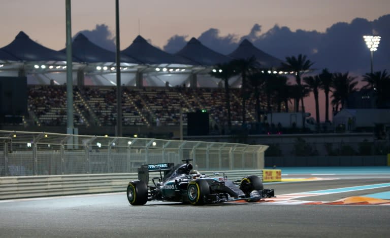 Mercedes AMG Petronas F1 Team's British driver Lewis Hamilton races during the Abu Dhabi Formula One Grand Prix at the Yas Marina circuit on November 29, 2015