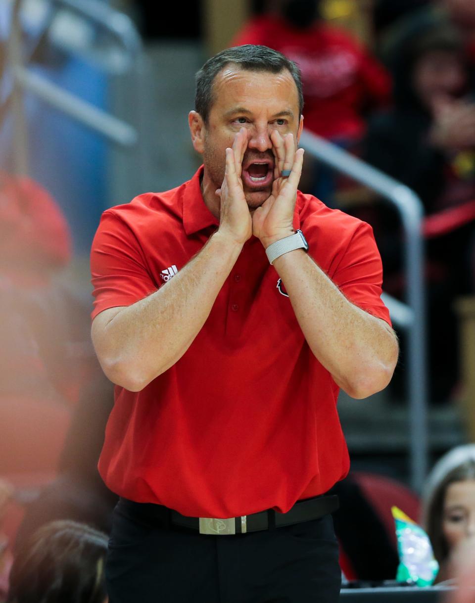 U of L head coach Jeff Walz instructed his team against Ohio State during their game at the Yum Center in Louisville, Ky. on Nov. 30, 2022.  