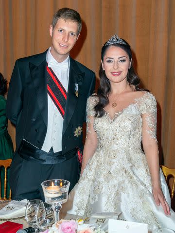 <p>Luc Castel/GettyImages</p> Elia Zaharia and Crown Prince Leka of Albania on their October 2016 wedding day.