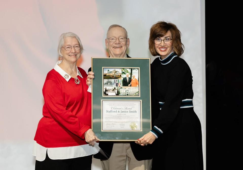 Chairman’s Award Winners Janice and Stafford Smith are pictured with Stephanie Baldwin at the 2023 Celebration of Champions on Wednesday, Dec. 13, 2023.