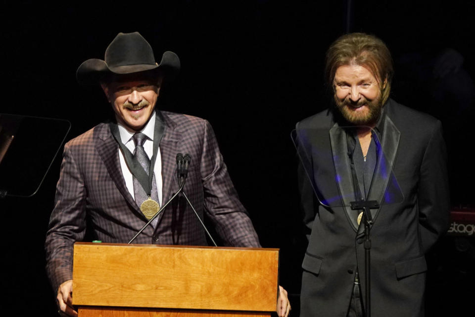 Kix Brooks, left, and Ronnie Dunn, right, speak after being inducted into the Country Music Hall of Fame at 2019 Medallion Ceremony at the Country Music Hall of Fame and Museum on Sunday, Oct. 20, 2019 in Nashville, Tenn. (Photo by Sanford Myers/Invision/AP)