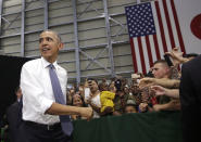 <p>President Barack Obama is greeted by U.S. Marines and their families at Iwakuni air station in Iwakuni, Japan, Friday, May 27, 2016, after attending the G-7 Summit in Shima, central Japan. (Photo: Carolyn Kaster/AP) </p>