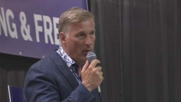 People's Party of Canada Leader Maxime Bernier speaking to supporters at a community hall in Cochrane, Alta., on Aug. 30. (CBC - image credit)