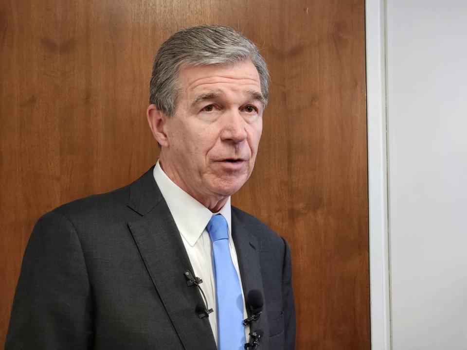 N.C. Gov. Roy Cooper talked to reporters on Tuesday, Dec. 6, 2022, after a Council of State meeting at the Department of Transportation agency headquarters in downtown Raleigh. Dawn Baumgartner Vaughan/dvaughan@newsobserver.com