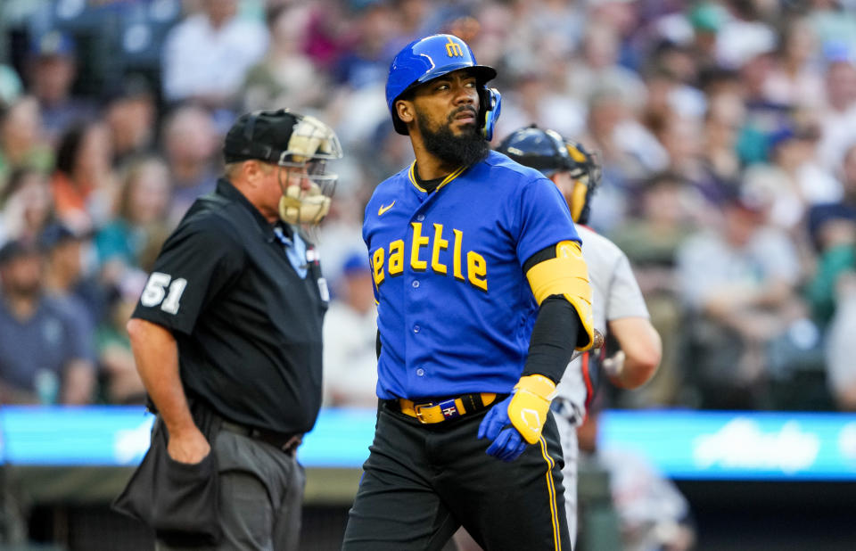 Seattle Mariners' Teoscar Hernandez walks away after striking out against the Detroit Tigers during the fourth inning of a baseball game Friday, July 14, 2023, in Seattle. (AP Photo/Lindsey Wasson)