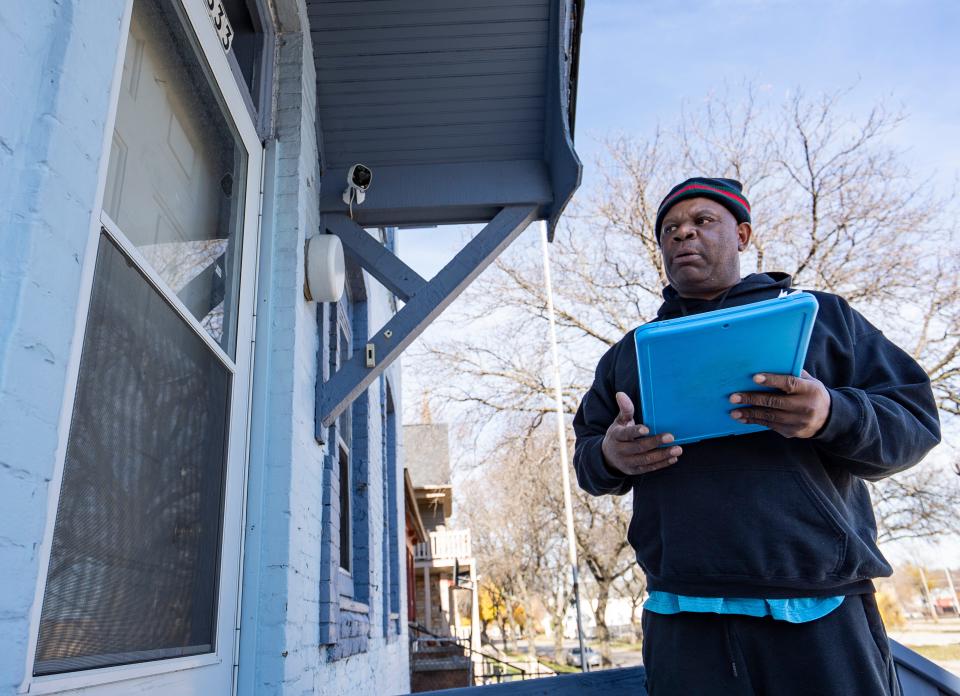 Ken Ezell, Lead ambassador for BLOC (Black Leaders Organizing Communities), does voter canvassing in the Harambee neighborhood on November 15, in Milwaukee.