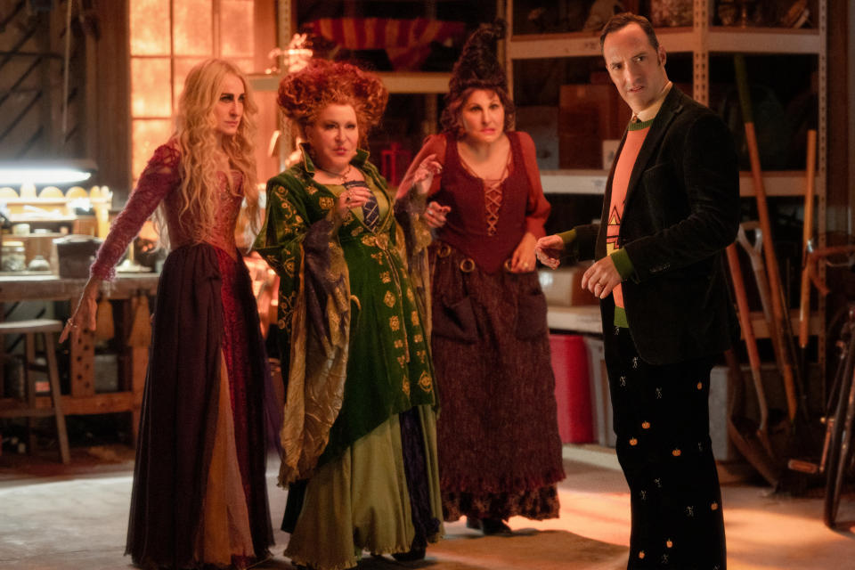 (L-R): Sarah Jessica Parker as Sarah Sanderson, Bette Midler as Winifred Sanderson, Kathy Najimy as Mary Sanderson, and Tony Hale as Mayor Traske in HOCUS POCUS 2, exclusively on Disney+. (Photo by Matt Kennedy)