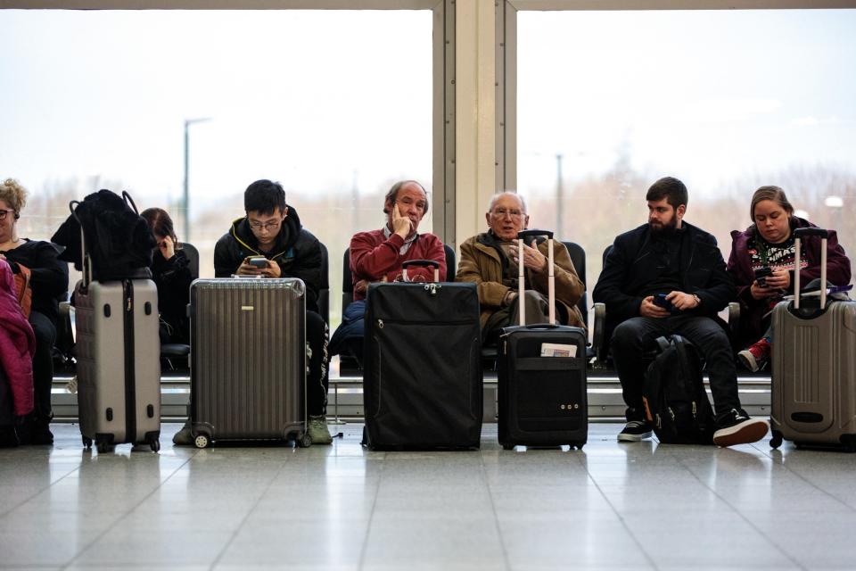 Passengers wait in the South Terminal building at London Gatwick (Getty Images)