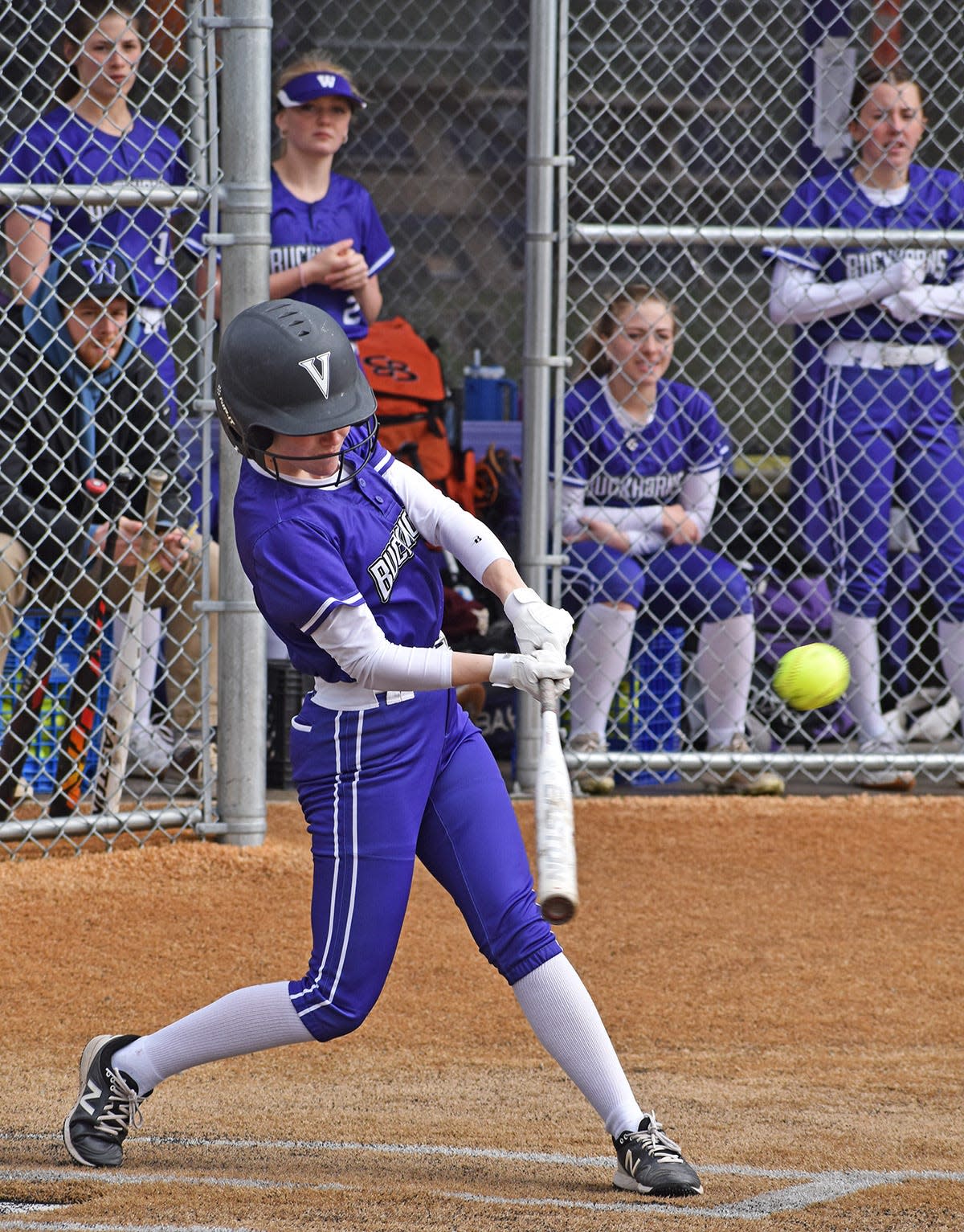 Emily Sterner of Wallenpaupack Area pounces on a pitch against West Scranton and lines it up the middle for a basehit.
