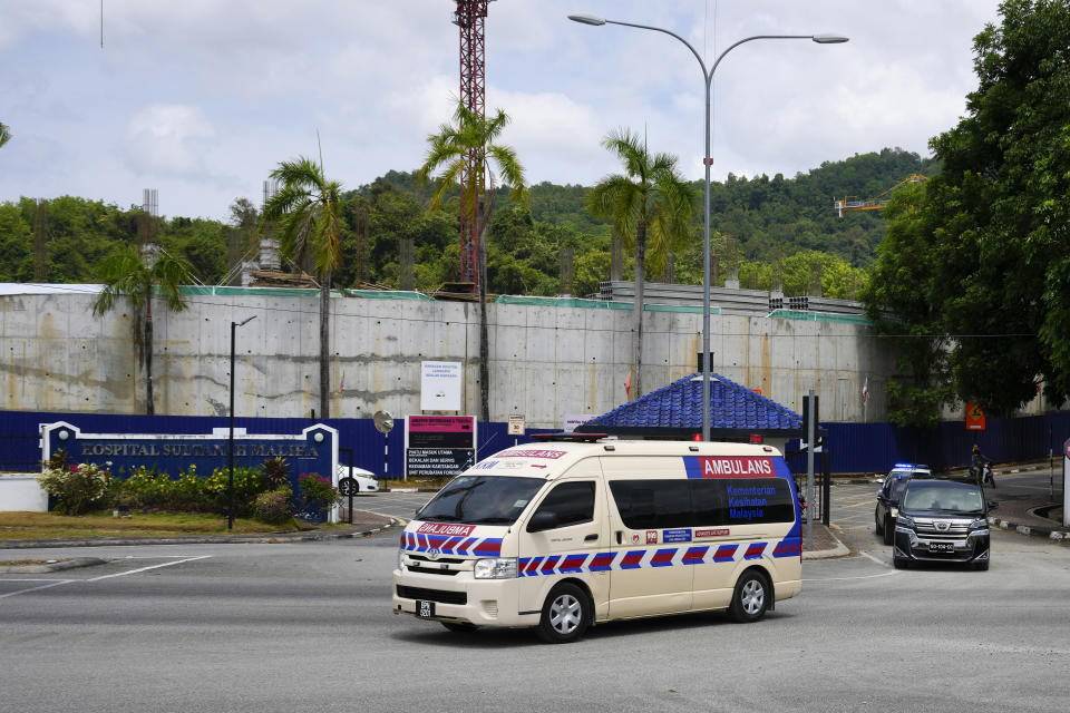 Ambulance believed to be carrying Norway's King Harald leave Sultanah Maliha Hospital, where Norway's King Harald has been admitted with an infection, on the Malaysian resort island of Langkawi, Malaysia, Sunday, March 3, 2024. (AP Photo/Vincent Thian)