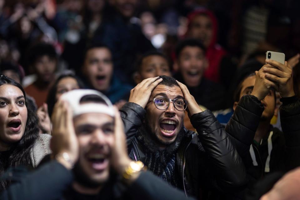 Moroccan fans react while watching the semi-final in Rabat (AP)