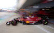 In this image taken with a slow shutter speed, Ferrari driver Carlos Sainz of Spain leaves pits during the third free practice at the Silverstone circuit, in Silverstone, England, Saturday, July 2, 2022. The British F1 Grand Prix is held on Sunday July 3, 2022. (AP Photo/Matt Dunham)