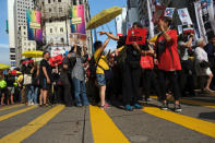 Demonstrators hold yellow umbrellas, the symbol of the Occupy Central movement during a protest to demand authorities scrap a proposed extradition bill with China, in Hong Kong, China April 28, 2019. REUTERS/Tyrone Siu