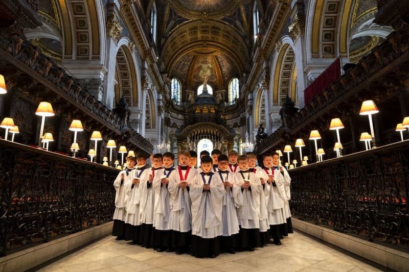 Choristers of St Paul's Cathedral choir in London perform during their preparations for Advent and Christmas services, which they will perform throughout December. Jordan Pettitt/PA Wire/dpa