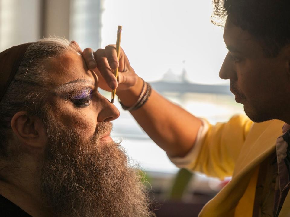 Bradford getting makeup applied on "We're Here" season 4