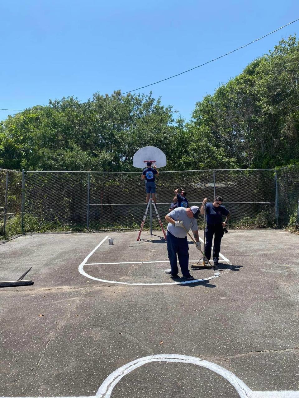 Crews from Horry County Fire Rescue team repaired a community basketball court in Atlantic Bech that was once used by the community years ago.