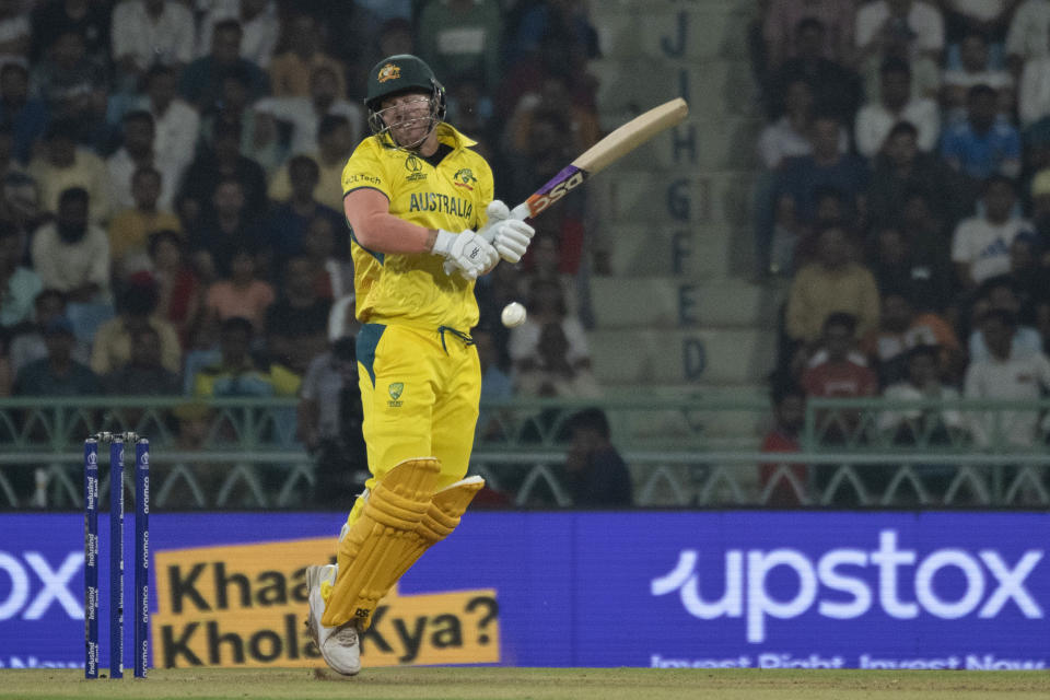 David Warner of Australia plays a shot during the ICC Cricket World Cup match between Australia and South Africa in Lucknow, India, Thursday, Oct. 12, 2023. (AP Photo/Rajesh Kumar Singh)