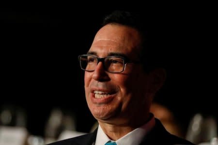 FILE PHOTO - U.S. Treasury Secretary Steven Mnuchin speaks during a moderated discussion before the Economic Club of New York, in New York City, U.S., November 9, 2017. REUTERS/Brendan McDermid