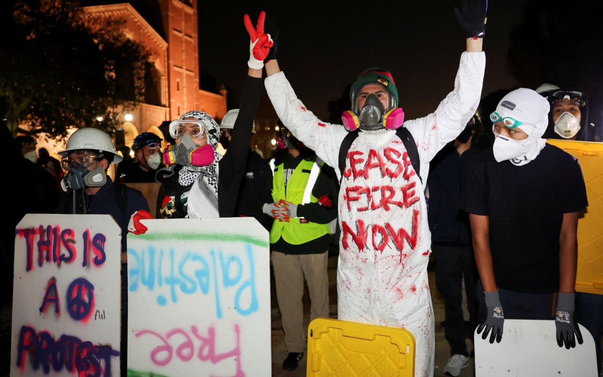 A protest at an encampment in support of Palestinians in Gaza at the University of California, Los Angeles