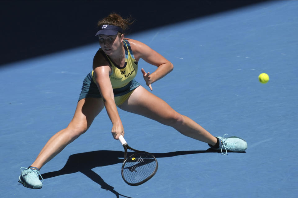 Linda Noskova of the Czech Republic plays a forehand return to Dayana Yastremska of Ukraine during their quarterfinal match at the Australian Open tennis championships at Melbourne Park, Melbourne, Australia, Wednesday, Jan. 24, 2024. (AP Photo/Andy Wong)