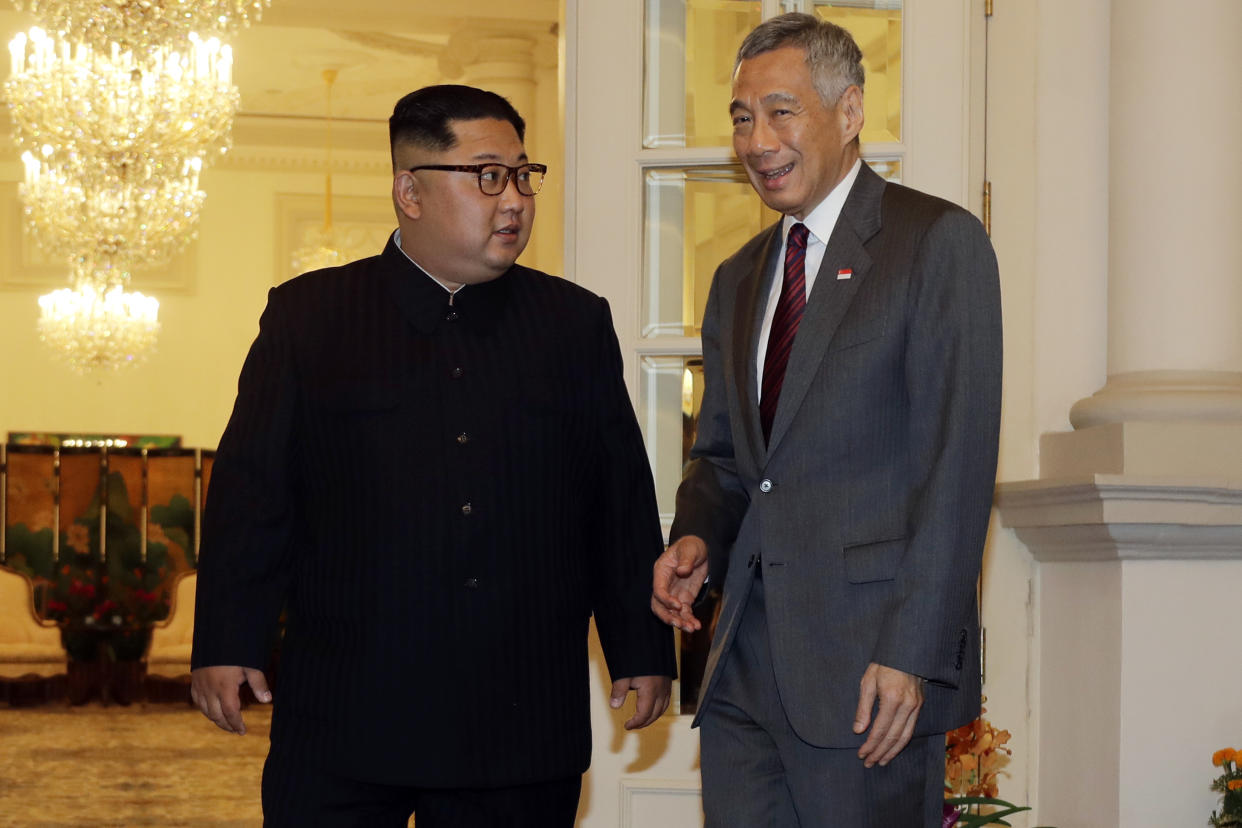 North Korean leader Kim Jong Un meets with Singapore’s Prime Minister Lee Hsien Loong on Sunday ahead of talks with Donald Trump. (AP Photo/Wong Maye-E)