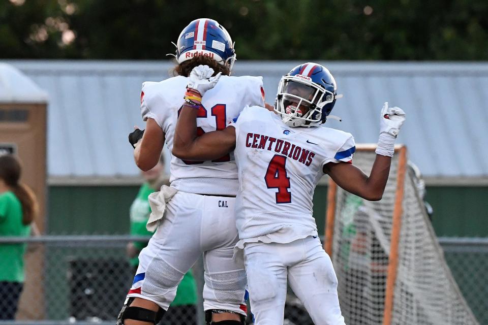 Christian Academy’s Justin Ruffin (4) celebrates with teammate Noah Hazelip after scoring a touchdown in their game against South Oldham at South Oldham High School, Friday, Aug. 19 2022 in Crestwood Ky.