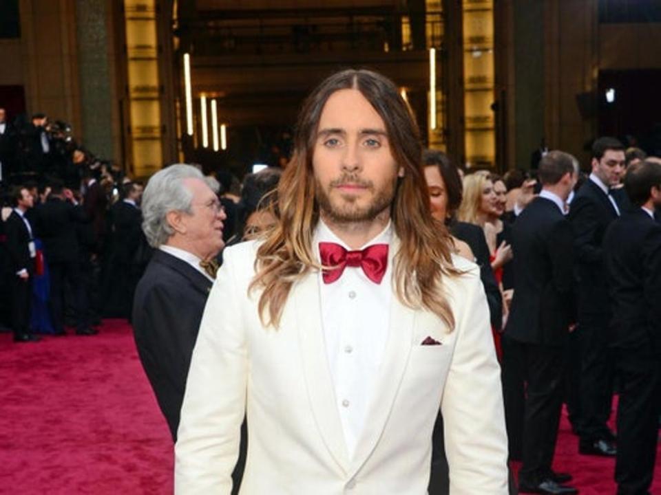 Gucci style icon Jared Leto wore a Saint Laurent tuxedo, bow tie by Monsieur Jean Yves, cufflinks and studs by Neil Lane, and watch by Piaget for the 86th Academy Awards. (Getty)