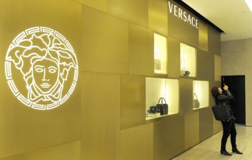 This file photo shows part of exterior of a boutique of Italian fashion brand Versace, in Chengdu, the capital of China's southwestern province of Sichuan. Italy's top designer brands are looking to China for salvation this year with revenues falling due to a debt crisis that has cast an air of gloom as Milan Fashion Week kicks off on Wednesday