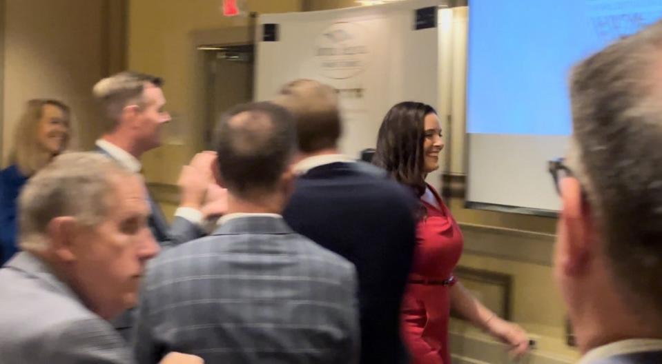 Corrine Heck, founder of Details Flowers Software, gets a standing ovation after her Ormond Beach company is named "Small Business of the Year" at the Daytona Regional Chamber of Commerce's 10th annual awards luncheon at The Shores Resort & Spa in Daytona Beach Shores on Wednesday, Nov. 1, 2023.