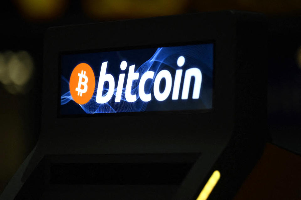 A Bitcoin sign on a Bitcoin ATM, after its inauguration by Athena Bitcoin Inc at a shopping mall in San Salvador, on June 24, 2021. The Bitcoin is an official currency in El Salvador