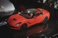 General Motors unveils its newly redesigned Corvette Stingray in a formal industrial complex.