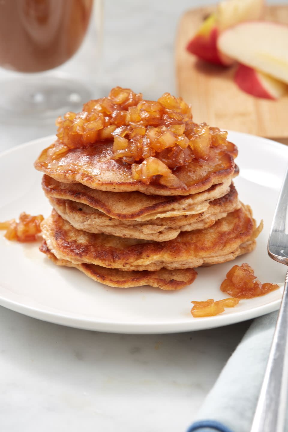 <p>There's nothing like a fresh stack of <a href="https://www.delish.com/cooking/menus/recipes/a50760/perfect-pancakes-recipe/" rel="nofollow noopener" target="_blank" data-ylk="slk:pancakes;elm:context_link;itc:0;sec:content-canvas" class="link ">pancakes</a> on a weekend morning, and these may just be our new favorite. Topped with a sticky, cinnamon-scented apple compote, we don't even <em>need</em> maple syrup. Looking for something on the lighter side? Try our <a href="https://www.delish.com/cooking/recipe-ideas/recipes/a50098/apple-pancake-dippers-recipe/" rel="nofollow noopener" target="_blank" data-ylk="slk:apple pancake dippers;elm:context_link;itc:0;sec:content-canvas" class="link ">apple pancake dippers</a>, they're *mostly* fruit! </p><p>Get the <strong><a href="https://www.delish.com/cooking/recipe-ideas/a28186318/apple-pancakes-recipe/" rel="nofollow noopener" target="_blank" data-ylk="slk:Apple Spiced Pancakes recipe;elm:context_link;itc:0;sec:content-canvas" class="link ">Apple Spiced Pancakes recipe</a></strong>.</p>