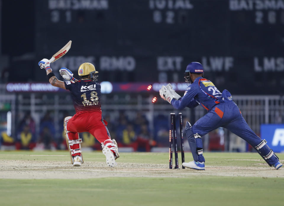 Lucknow Super Giants' Nicholas Pooran successfully stumps Royal Challenger Bangalore's Virat Kohli during the Indian Premier League (IPL) match between Lucknow Super Giants and Royal Challenger Bangalore in Lucknow, India, Monday, May 1, 2023. (AP Photo/Surjeet Yadav)