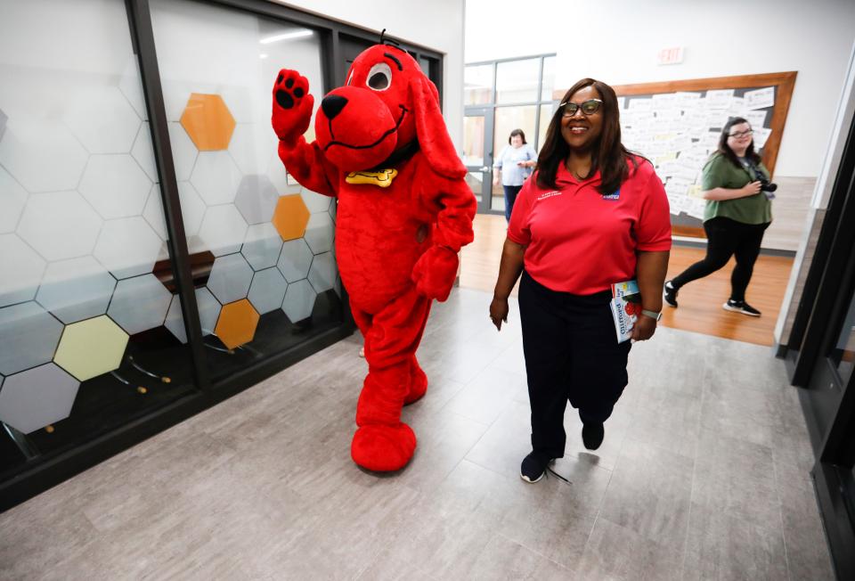 Springfield Superintendent Grenita Lathan joined Clifford the Big Red Dog to encourage reading July 8 at Sunshine Elementary.