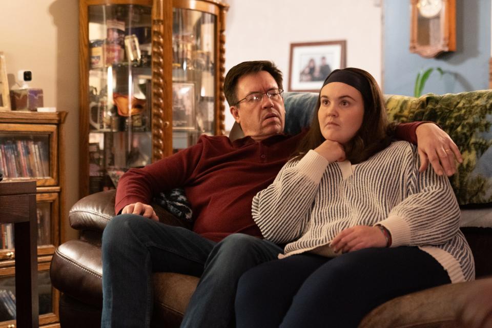 Rick Elskamp talks with his daughter, Sheridan Elskamp, 23, Thursday evening about what to watch on TV.
