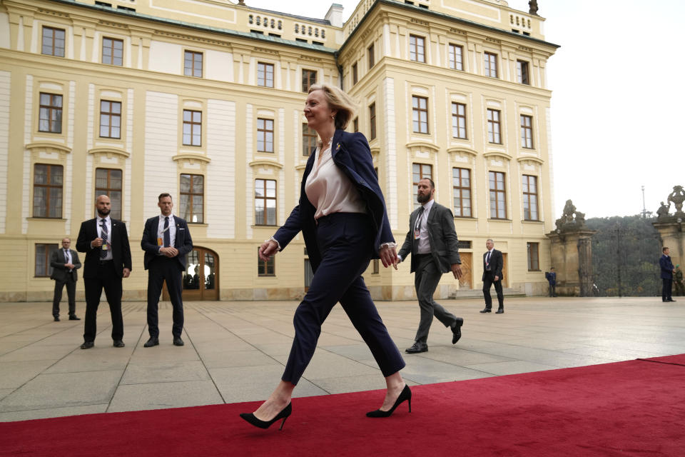 British Prime Minister Liz Truss arrives for a meeting of the European Political Community at Prague Castle in Prague, Czech Republic, Thursday, Oct 6, 2022. Leaders from around 44 countries are gathering Thursday to launch a "European Political Community" aimed at boosting security and economic prosperity across the continent, with Russia the one major European power not invited. (AP Photo/Alastair Grant, Pool)