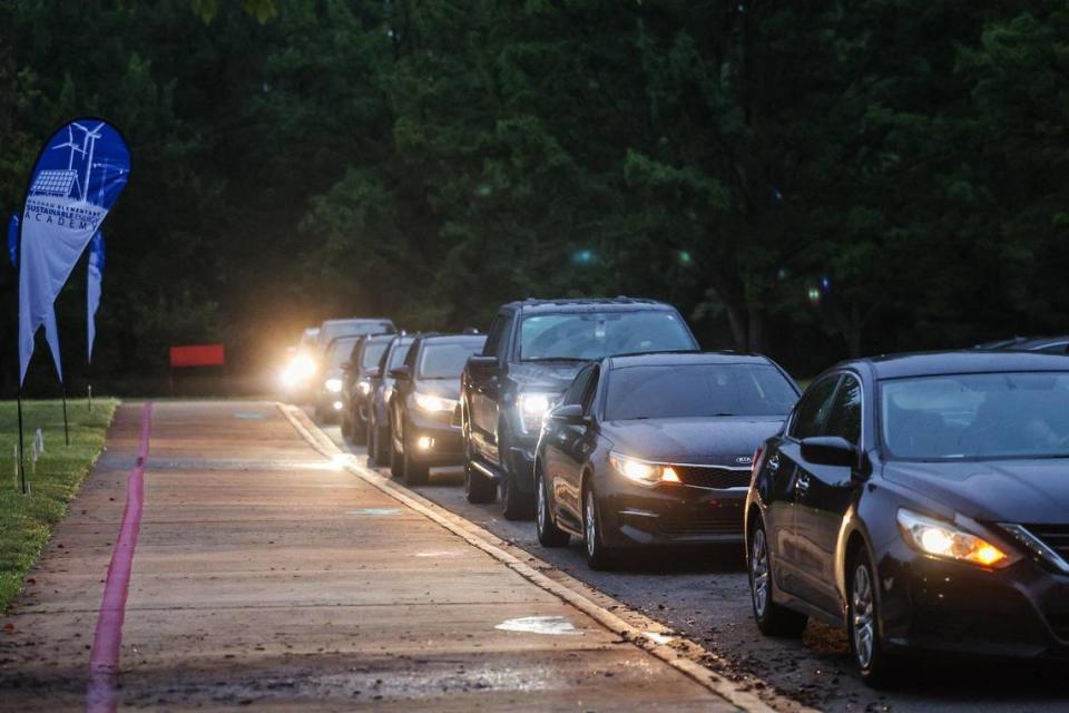A long line of cars await a 7:00 a.m. drop-off for the first day of school at Waxhaw Elementary School on Monday, August 28, 2023.