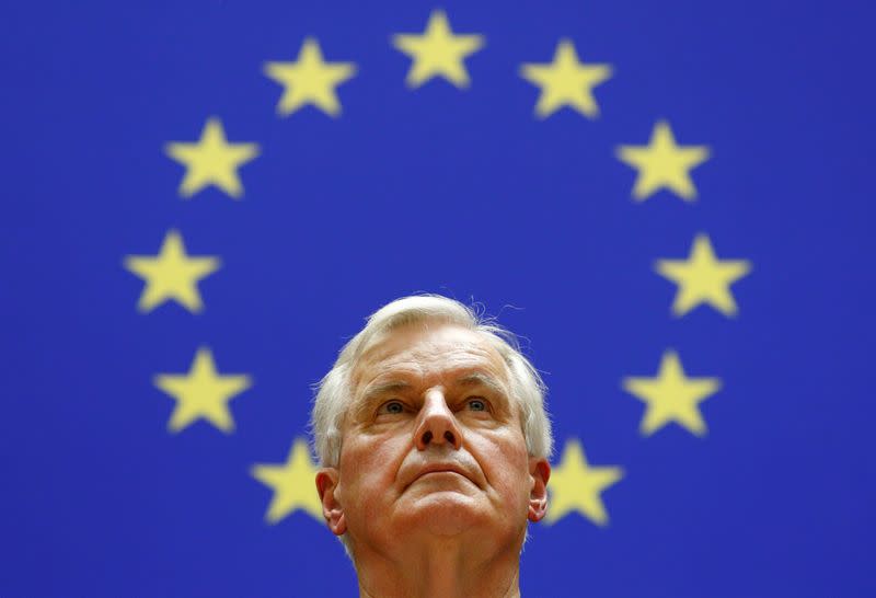 Barnier, EU Commission's Head of Task Force for Relations with the UK, listens to the "Anthem of Europe" during a ceremony at the EU Parliament in Brussels