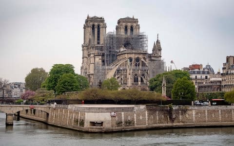 The Notre-Dame still towers over Paris following last night's devastation - Credit: Victoria Jones/&nbsp;PA