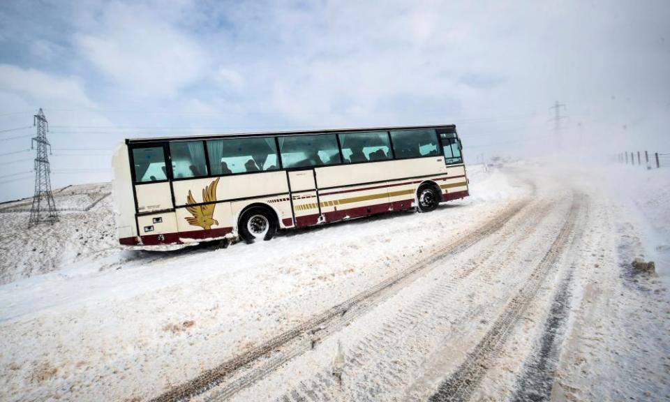 A stranded coach on Blackstone Edge near Littleborough in Greater Manchester.