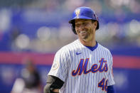 New York Mets' Jacob deGrom reacts after hitting an infield single off Miami Marlins starting pitcher Trevor Rogers in the sixth inning of a baseball game, Saturday, April 10, 2021, in New York. (AP Photo/John Minchillo)