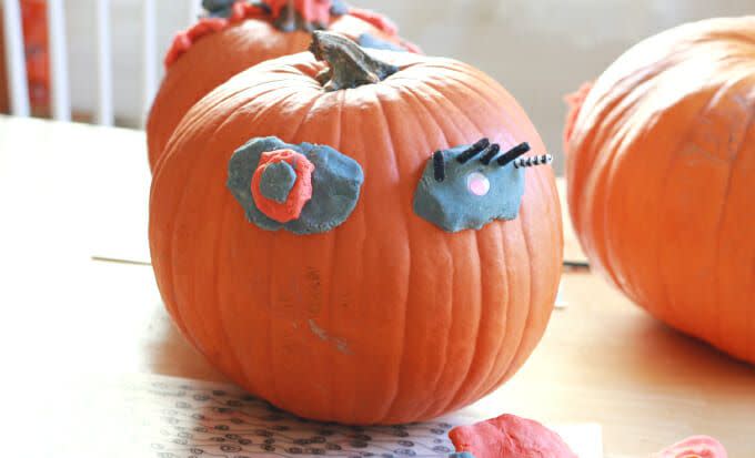 <p>Pumpkin decorating doesn't have to be just mom or dad's job, especially when no carving is involved. Using Play-Doh, this family project lets your kids bring their best creations to life—because sentimental gourds always rival even the most pristine painted pumpkins. </p><p><strong>Get the tutorial at <a href="https://artfulparent.com/easy-pumpkin-faces-playdough/" rel="nofollow noopener" target="_blank" data-ylk="slk:The Artful Parent;elm:context_link;itc:0;sec:content-canvas" class="link ">The Artful Parent</a>. </strong> </p>