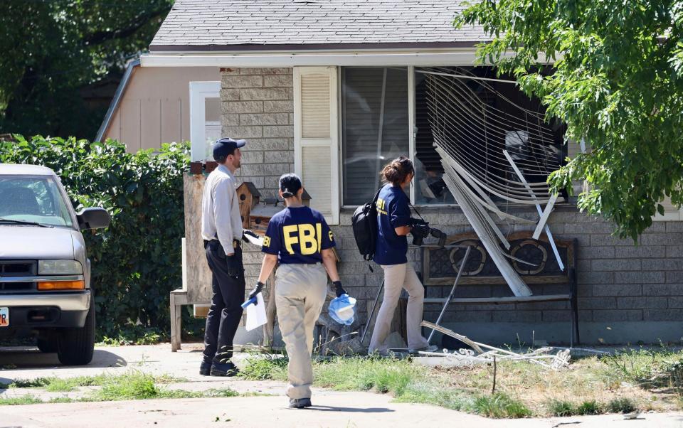 FBI agents at the scene of the shooting in Provo, Utah