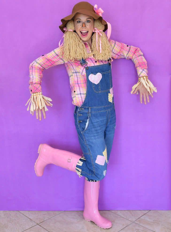 <p>Think pink! DIY yarn pigtails take this cheerful scarecrow costume to the next level. </p><p><strong>Get the tutorial at <a href="https://www.dreamalittlebigger.com/post/super-last-minute-scarecrow-costume.html" rel="nofollow noopener" target="_blank" data-ylk="slk:Dream A Little Bigger;elm:context_link;itc:0;sec:content-canvas" class="link ">Dream A Little Bigger</a>.</strong><br></p><p><a class="link " href="https://www.amazon.com/Grace-Elbe-Womens-Collared-Flannel/dp/B0772MWD8W/ref=sr_1_3?tag=syn-yahoo-20&ascsubtag=%5Bartid%7C10050.g.28190286%5Bsrc%7Cyahoo-us" rel="nofollow noopener" target="_blank" data-ylk="slk:SHOP PINK PLAID SHIRTS;elm:context_link;itc:0;sec:content-canvas">SHOP PINK PLAID SHIRTS</a></p>