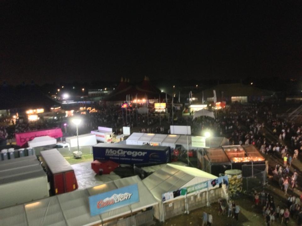 PLEASANT HOSTS, FINALLY: View of the festival in Manchester from the ferris wheel in which I sat with my first sane host.