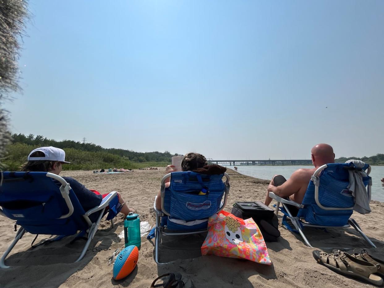 Community groups are asking people to be careful before venturing into water to cool down as Saskatchewan feels the effects of a blistering heat wave. (Pratyush Dayal/CBC - image credit)