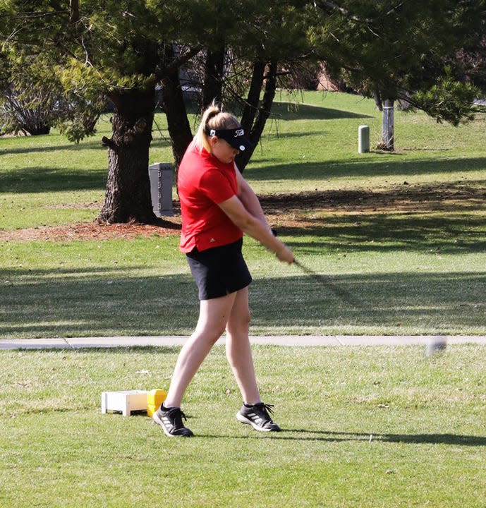 Abby Cook placed third with a nine-hole score of 51 to help the Roland-Story girls golf team easily take down Greene County during a home dual meet at the River Bend Golf Course in Story City April 10.